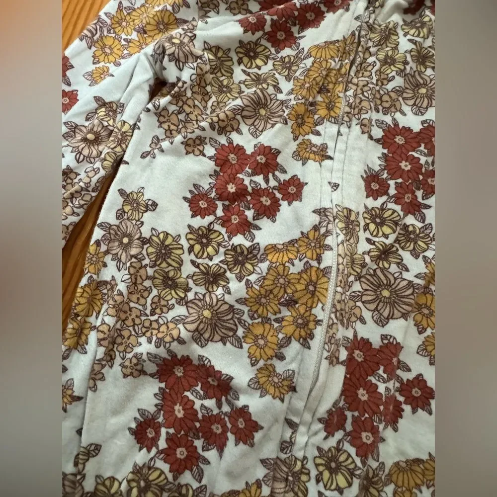 Kate Quinn Floral Onesie